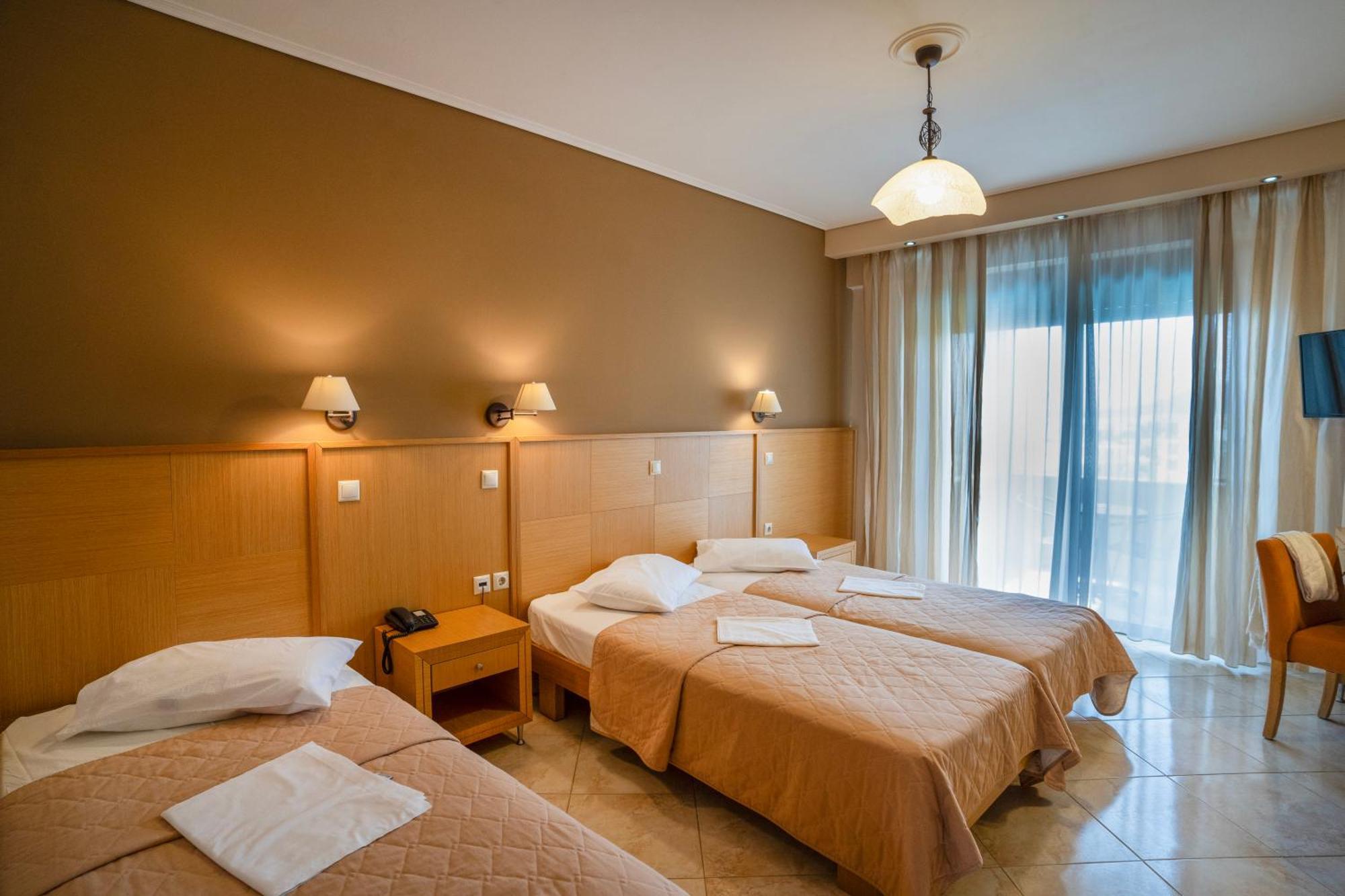 Evia Hotel & Suites Marmari  Ngoại thất bức ảnh